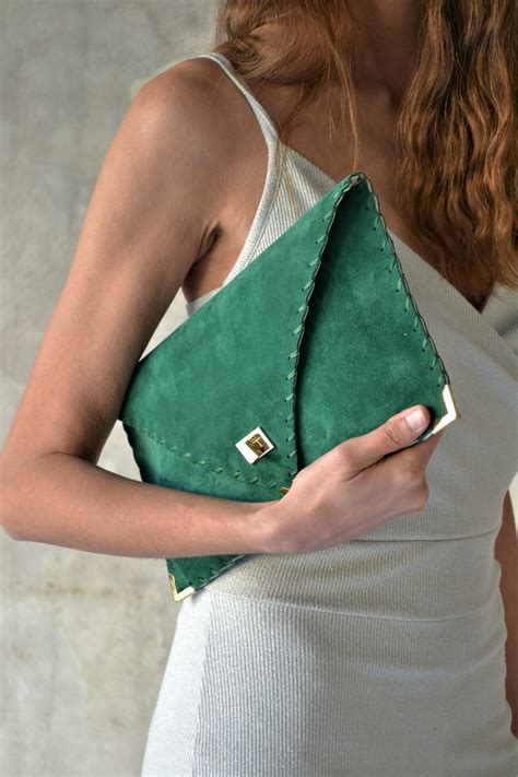 emerald green suede clutch bag